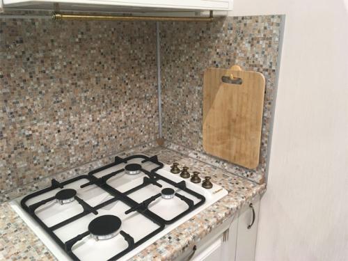 Чем заменить фартук на кухне так. Чем можно заменить фартук на кухне? 21